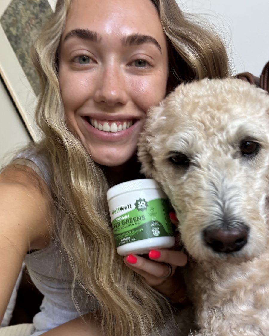 WuffWell customer with her goldendoodle